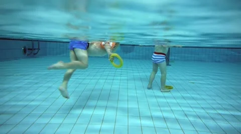 Children at a swimming pool Video stock 11859923