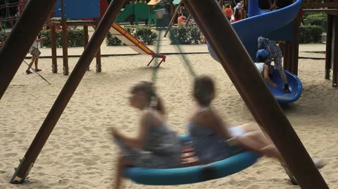 Children on a swing Stock Footage 42180660