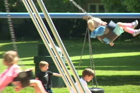 Children on Swing Set 1 Stock Footage