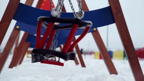 Children swing swaying in the wind Stock Footage 80484424