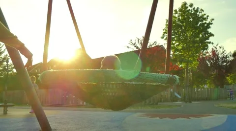 Children swinging on a swing Stock Footage 51222628