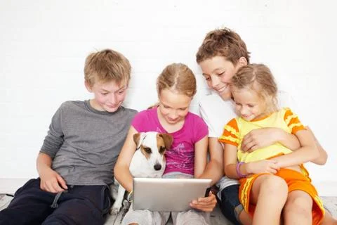 Children with tablet Stock Photos
