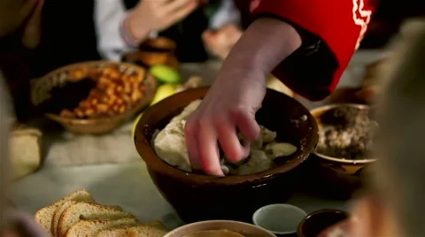 Children take dumplings from the pot Video stock 61739901