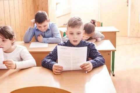 Children taking an exam Stock Photos