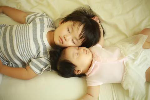 Children taking a nap Foto stock