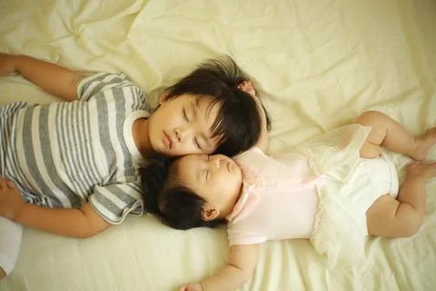 Children taking a nap Stock Photos