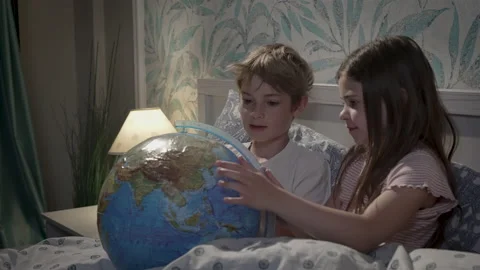 Children talking in bed. Stock Footage 165997563