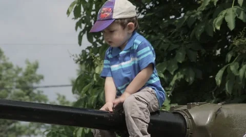 Children on the tank Stock Footage 49183033