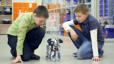 Children testing robot at school robotic... | Stock Video | Pond5