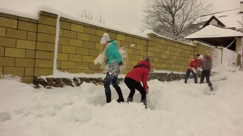 Children throw snow. Slow motion. Video stock 74666178