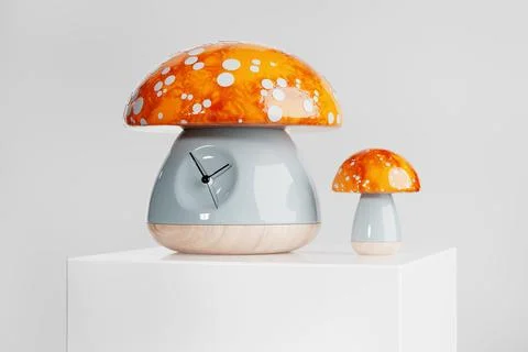 Children Toy Clock in a Shape of Red Fly Agaric Mushrooms. 3d Rendering Illustrazione stock
