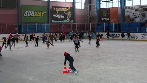 Children traing on the ice 2 Stock Footage 70507154