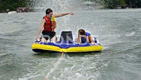 Children tubing Stock Photos