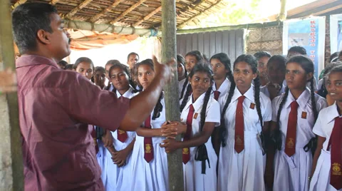 Children in uniform attend school outing in Sri Lanka Stock Footage
