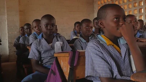 Children in uniform in the class at school Stock Footage 107193469