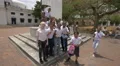 Children in uniforms waving and having fun in Panama City 4k or 4k+ Resolution