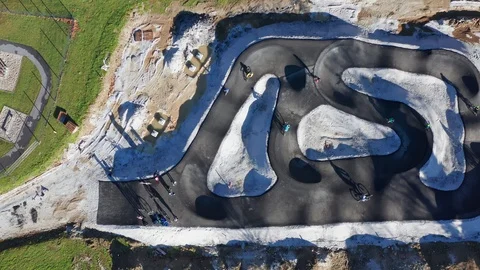 Children, unrecognizable, ride bicycles on pump track still under 스톡 동영상 122046881