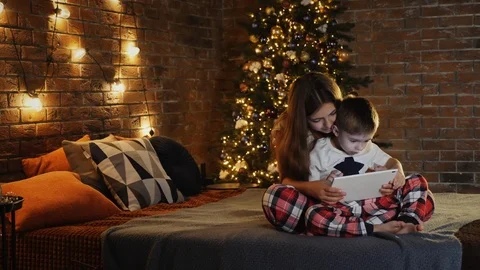 Children use a digital tablet computer in the bedroom Stock Footage 120508767