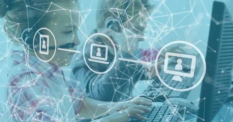 Children using computers with headsets, exploring digital interfaces in school Ilustración de archivo