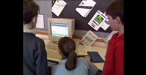 Children Using Computers at School (1990s) Video stock 317735964