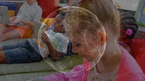 Children using devices in reading corner with network globe appearing Stockbeeldmateriaal 312281001