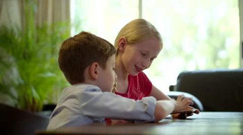 Children using digital tablet at home. Stock Footage 64108667