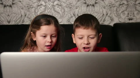 Children using laptop for online learning, happy kids looking at computer Stock Footage 197809490