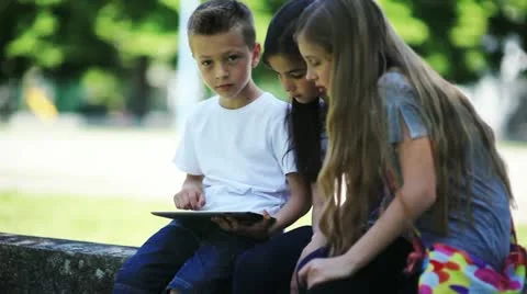 Children using PC tablet and mobile phone; Full HD Photo JPEG Stock Footage 11955287