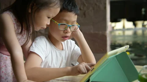 Children using a tablet computer Stock Footage 67579417