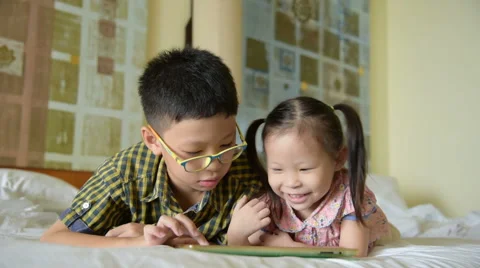 Children using a tablet computer Stock Footage 67971550
