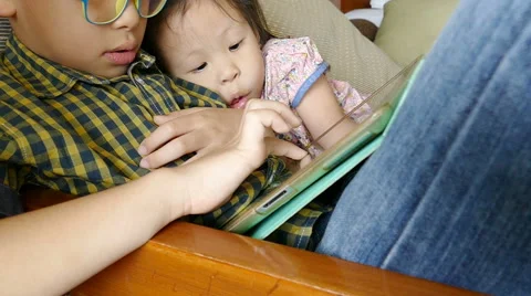 Children using a tablet computer Stock Footage 68229244