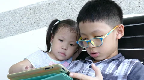 Children using a tablet computer Stock Footage 68239315