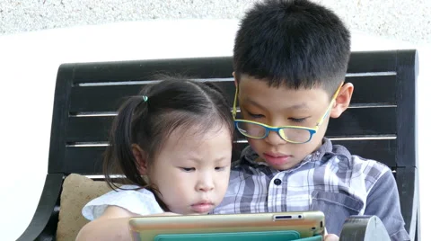 Children using a tablet computer Stock Footage 68240433