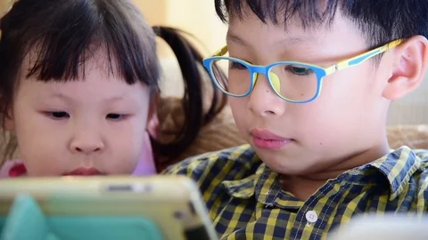 Children using a tablet computer Stock Footage 75170654