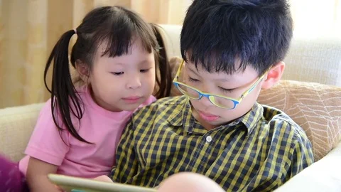 Children using a tablet computer Stock Footage 75172173