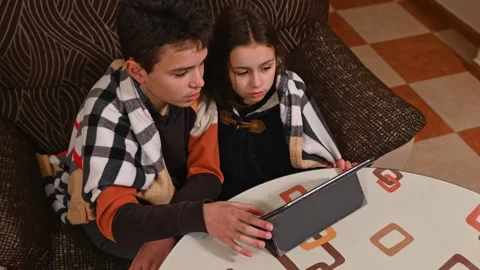 Children Video Calling on Tablet Video stock 297514489