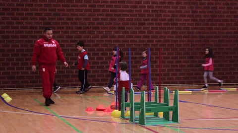 Children walking, doing free exercises in sports hall,sports recreation Stock Footage 34434444
