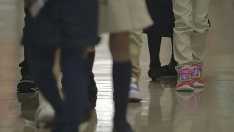 Children walking down Gilmartin Elementary School hallway Stock Footage 304371709