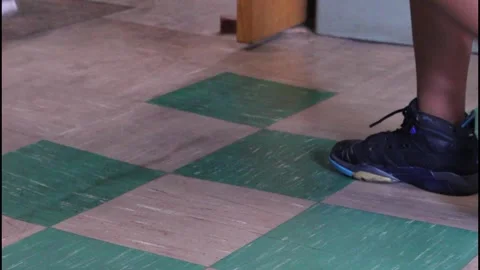 Children walking through Gilmartin Elementary school hallway shoes only 库存影片 304367640
