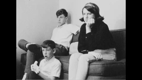 Children watch show on television - 1966 Stock Footage 99098705