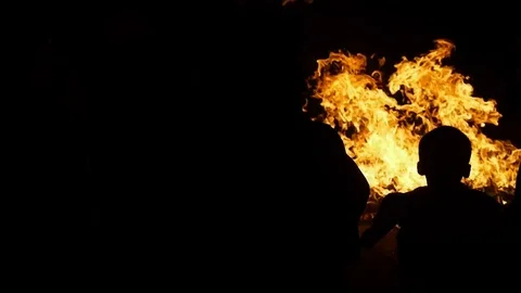 Children watching campfire celebration Stock Footage 80622732