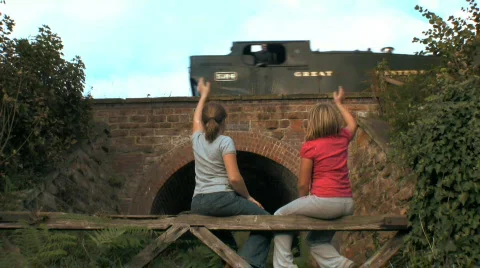 Children waving at a Steam train Stock Footage 522116