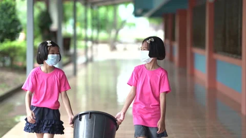 Children wearing mask and learning in classroom of school 動画素材 140117963