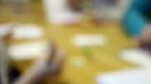 Children write at table Stock Footage 36042225