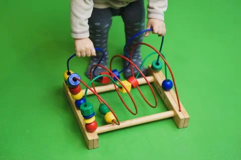Children's abacus on the floor. isolated on background. Scores Stock Photos