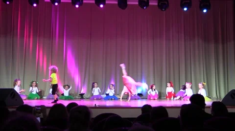 Children's Acrobatic stunt dance performance on concert hall stage Stock Footage 63502439