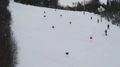 Children's Alpine skiing competitions in the open air in winter Stock Footage 102480822