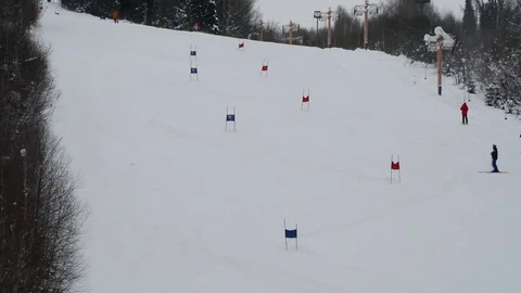 Children's Alpine skiing competitions in the open air in winter Stock Footage 102480916