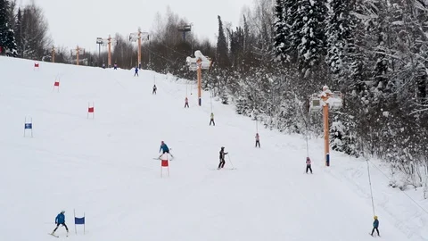 Children's Alpine skiing competitions in the open air in winter Stock Footage 102481182