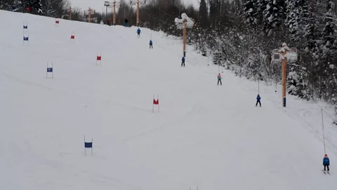 Children's Alpine skiing competitions in the open air in winter Stock Footage 102481502